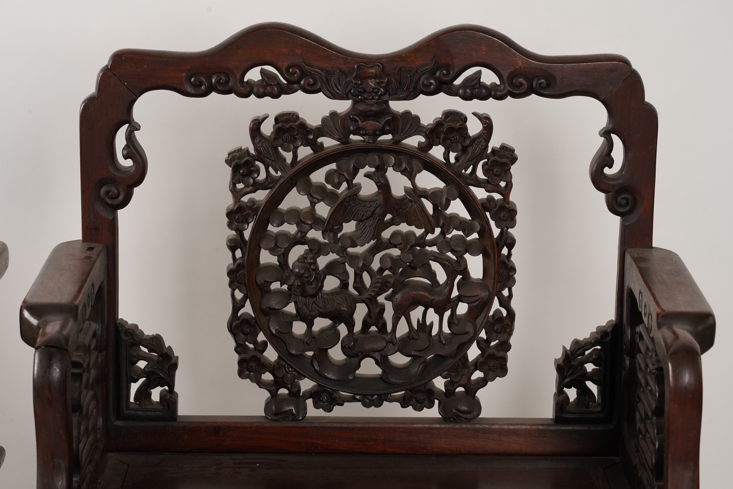 A pair of Chinese hongmu armchairs, late 19th century